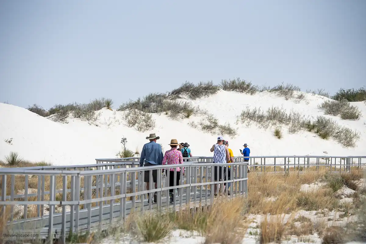 People walking on The Interdune Boardwalk - one of the best things to do in White Sands National Park.