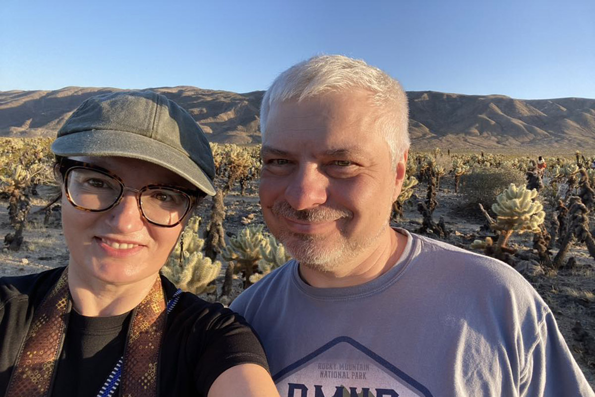 Agnes Stabinska, the author, and her partner Chris among cacti in Cholla Cactus Garden in Joshua Tree National Park. 