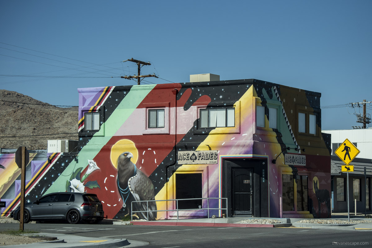 Colorful buildling with raven mural on the wall in Joshua Tree Town.